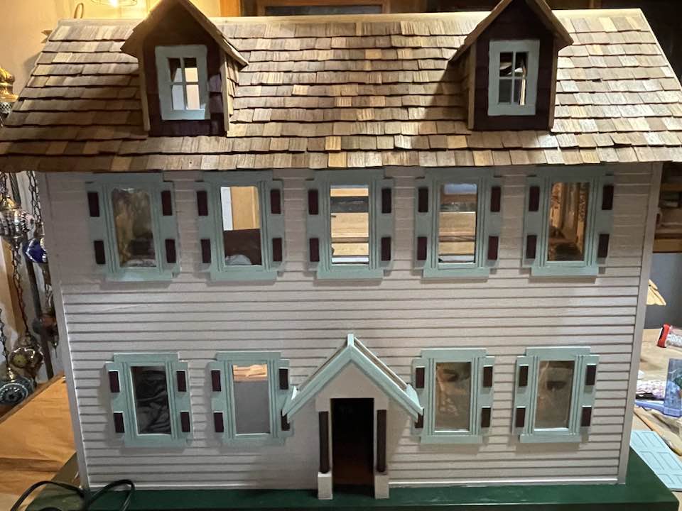 Refurbished 1980s dollhouse an artistic addition to cancer auction